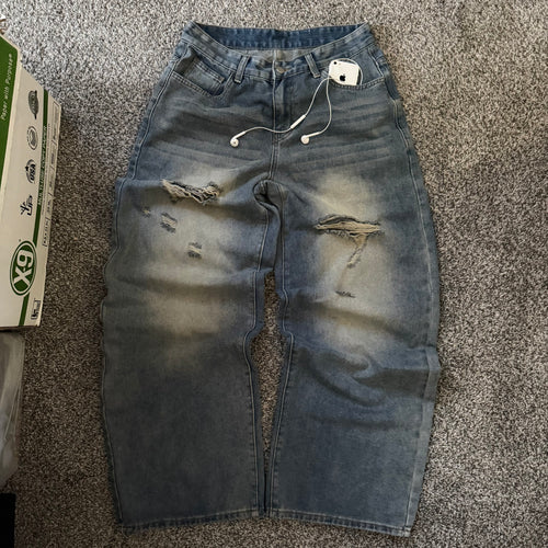 “Torn” jeans